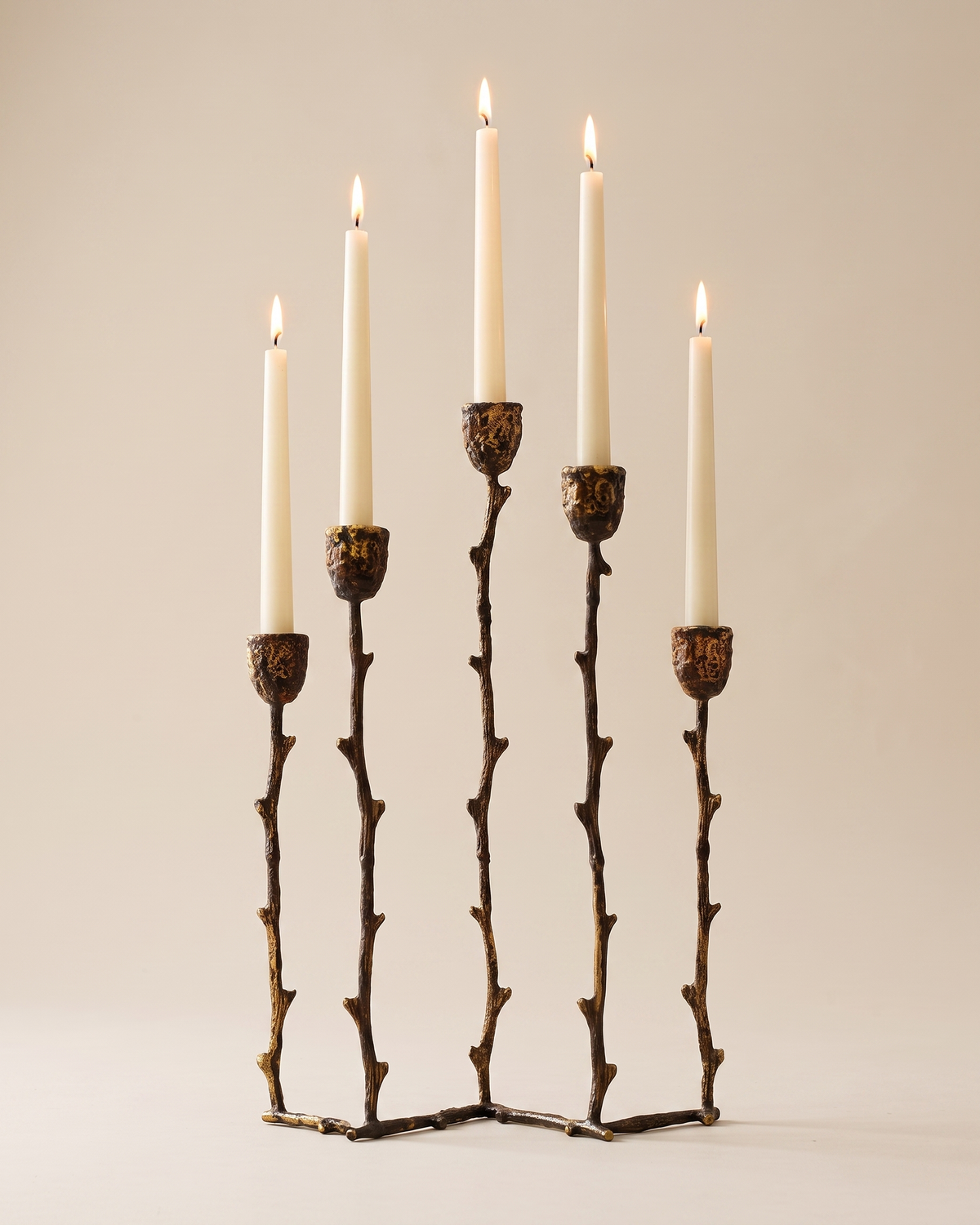 Branch Five-Arm Candelabra in Silvered Brass - with lit candles, ivory studio background