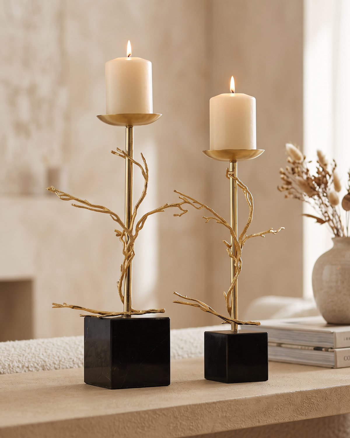 Brass Branch Candle Holder Gold - with lit candles, styled on a warm beige console in a cosy interior