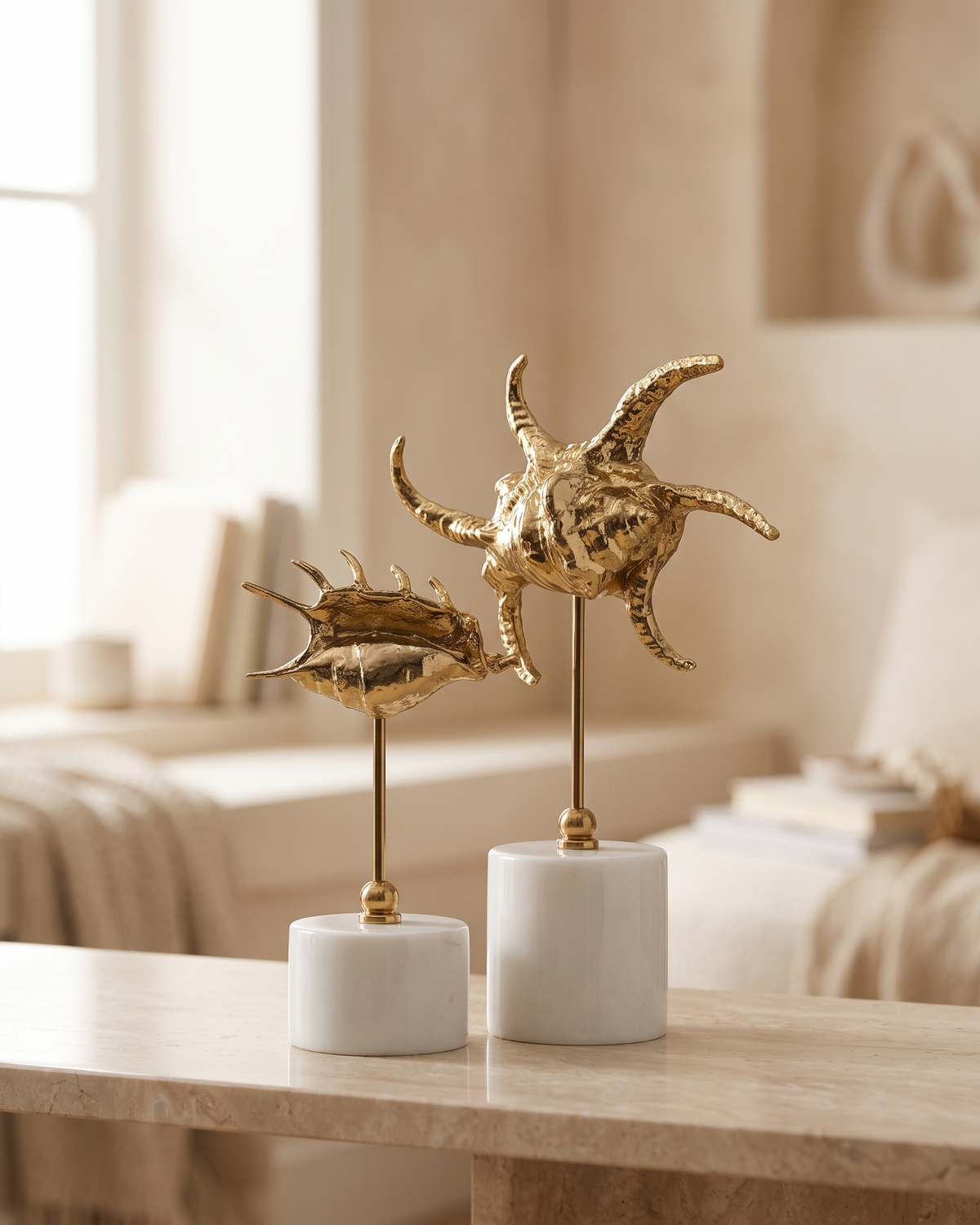 Brass Snail V - styled on a warm beige console in a cosy interior