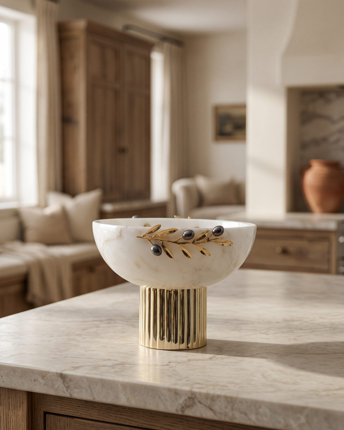 Double Olive Pedestal Bowl, White Marble (One Piece) styled in a warm interior