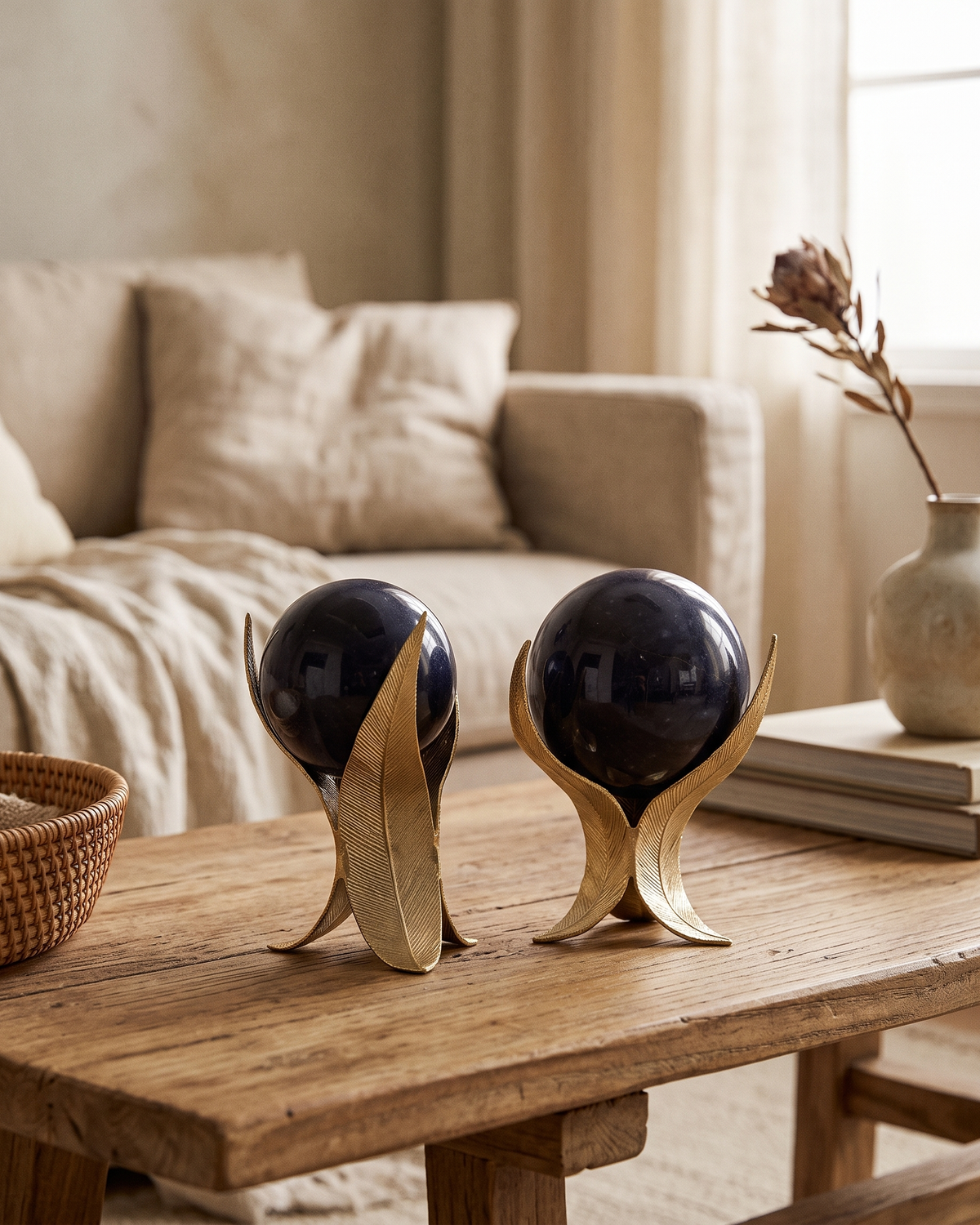 Feather Marble Spheres, Gold & Deep Blue (Set of 2) styled in a warm interior
