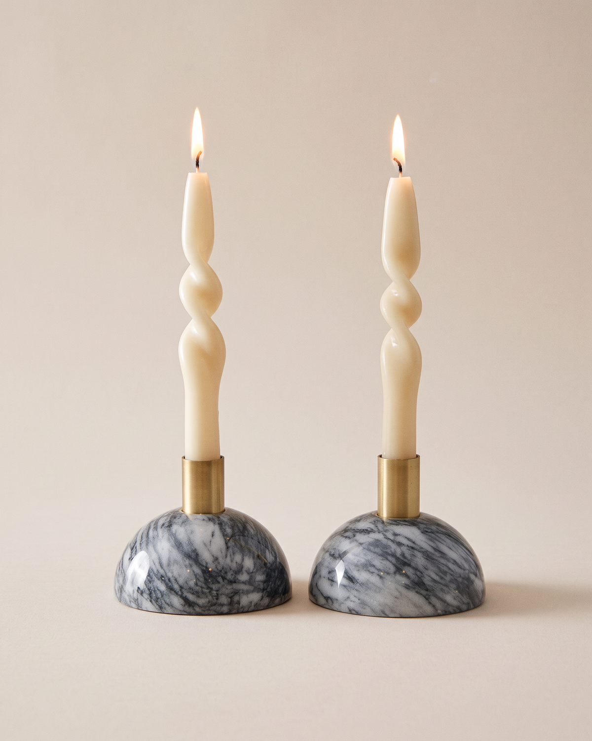 Half-Moon Marble Candlesticks (Set of 2) on a warm ivory studio background