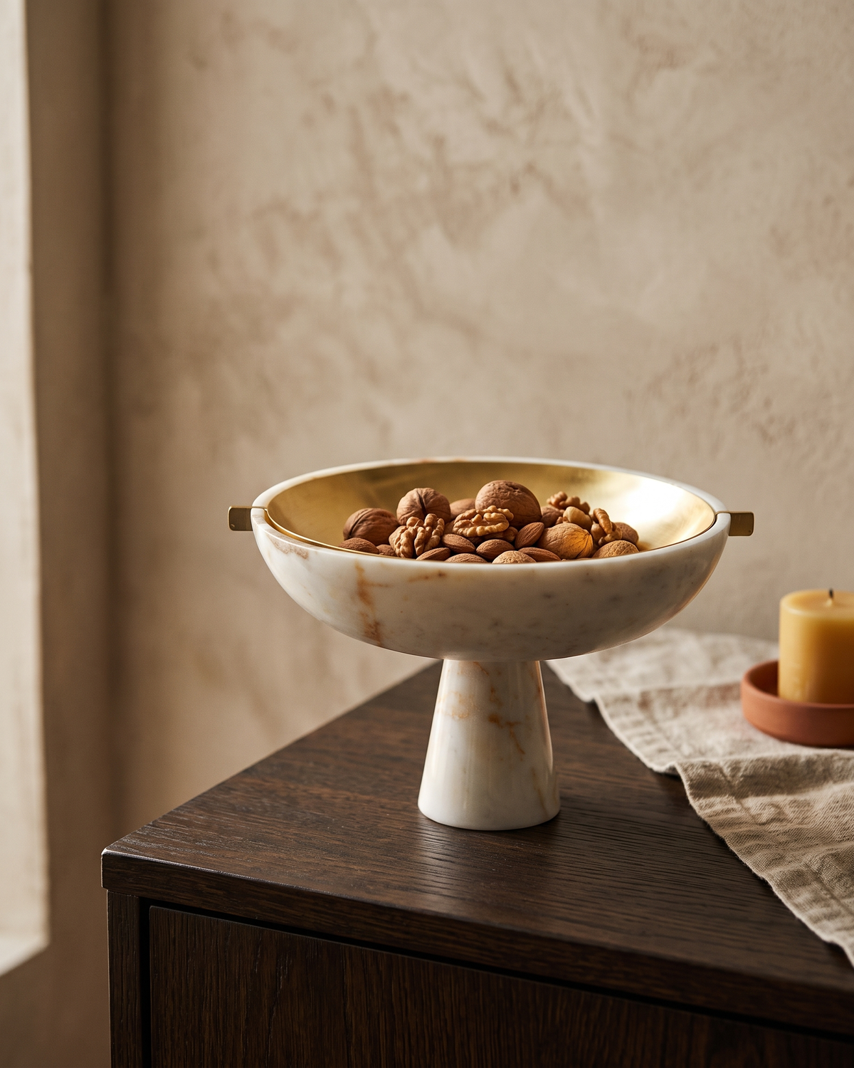 Handled Marble Bowl with Inner Brass Bowl III styled in a warm interior setting