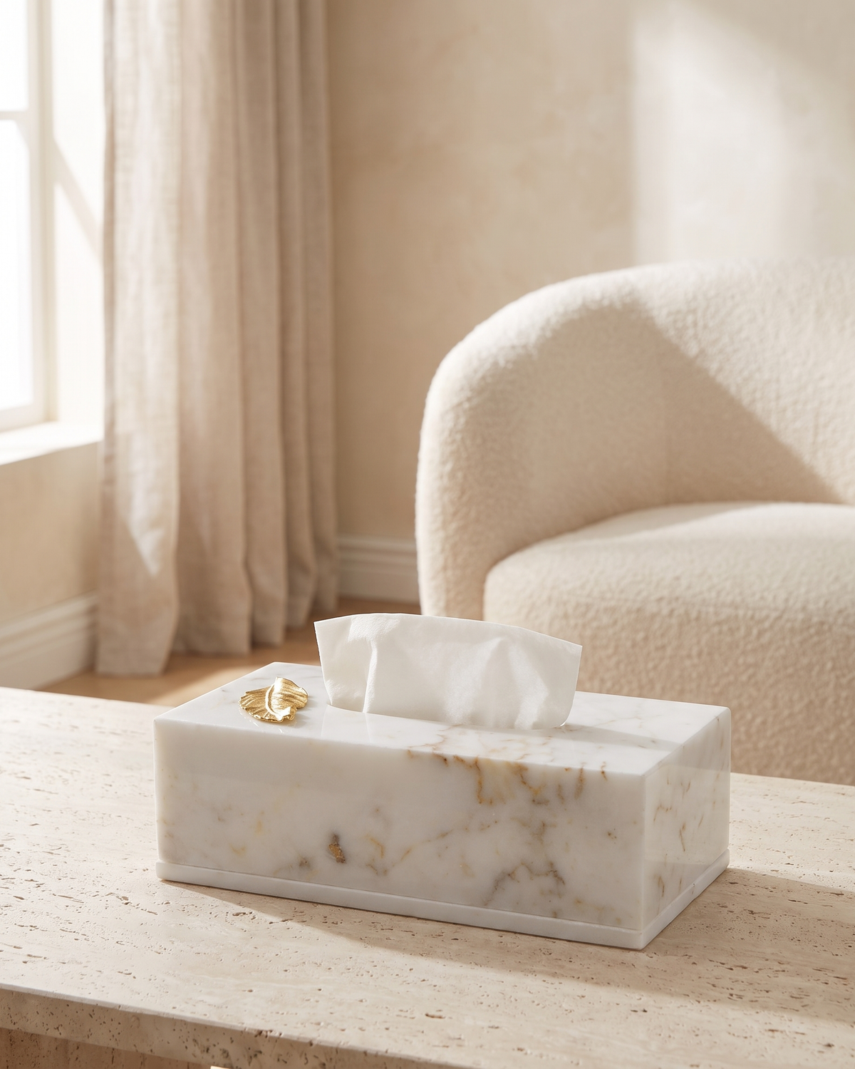 Marble Tissue Box with Brass Leaf Accent - styled on a travertine console in a light interior