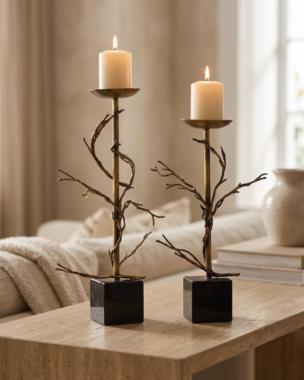 Aged Brass Branch Candle Holder - with lit candles, styled on a warm beige console in a cosy interior