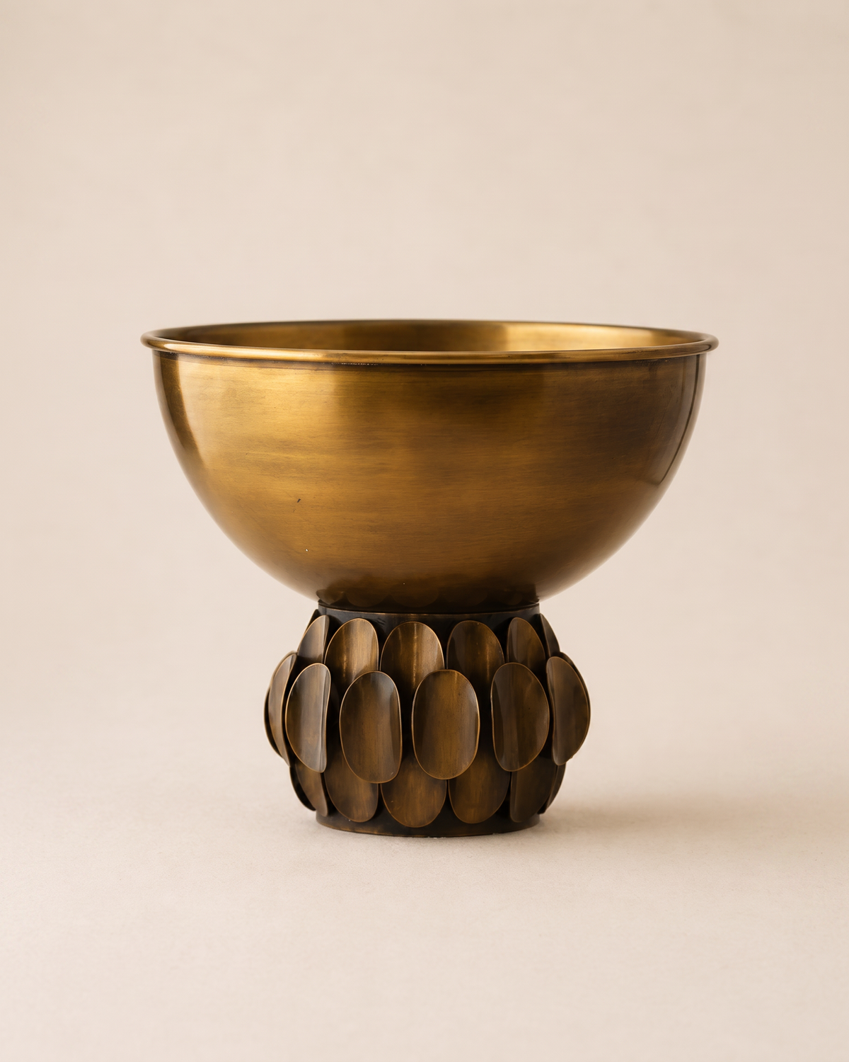Sequined Brass Bowl on a pale ivory studio background