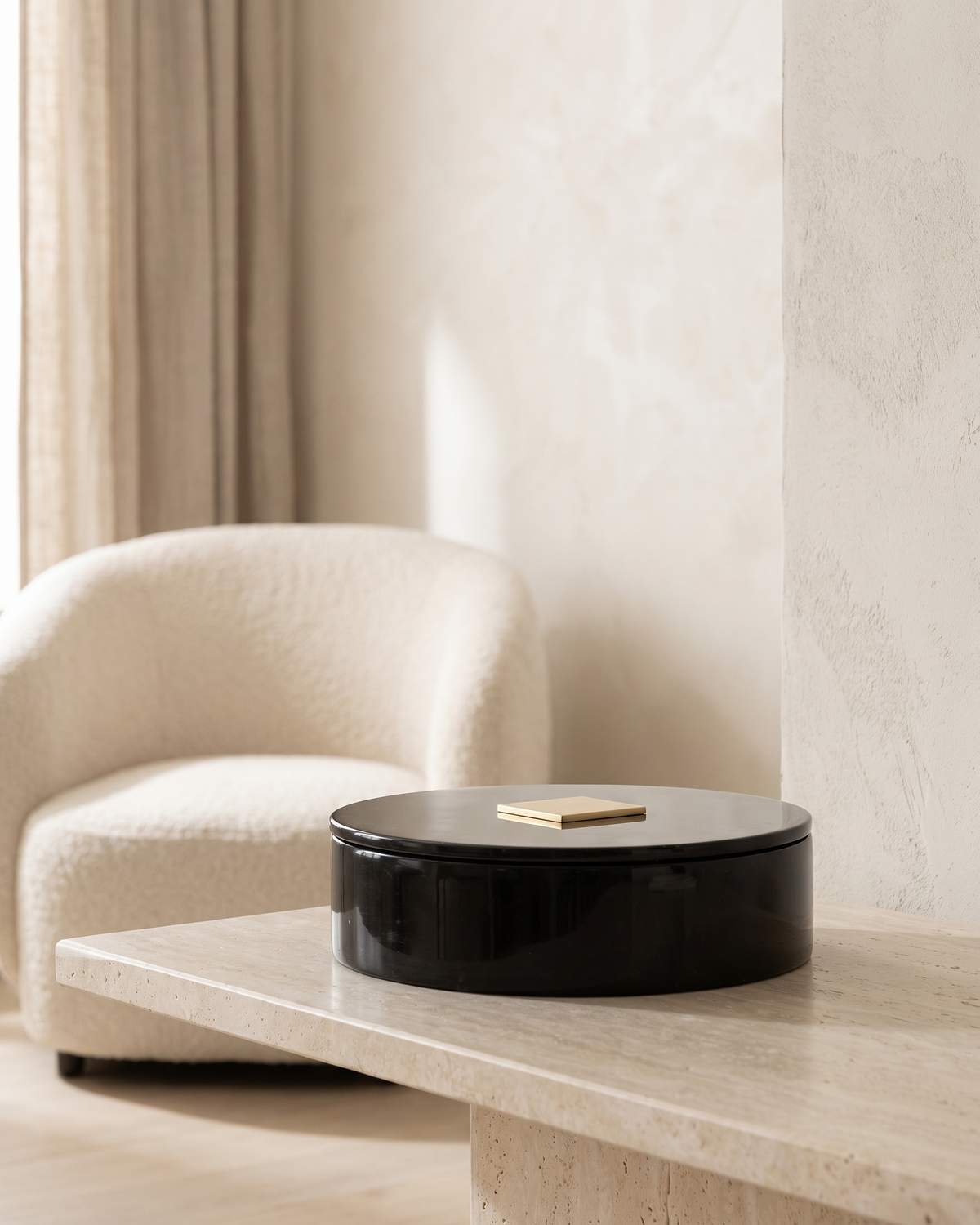 Valentino Box - styled on a travertine console in a light interior