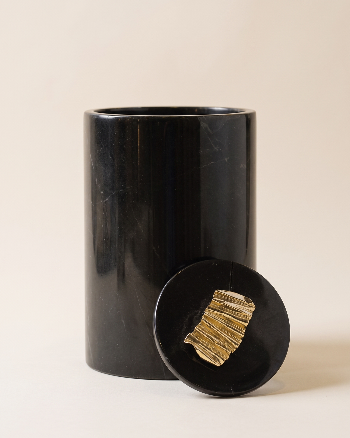 Waste Bin I on a pale ivory studio background