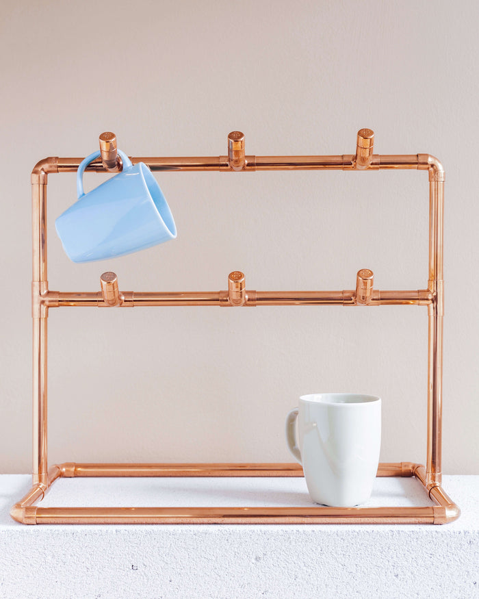 Copper Cup Stand – Industrial Display with Artisanal Charm