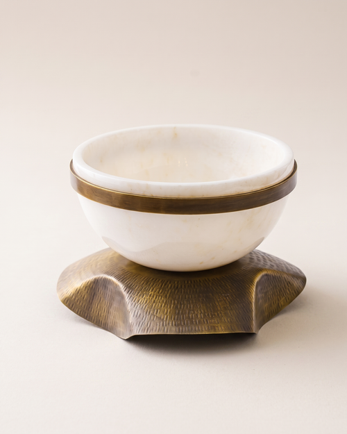 Amorphous Bowl on Brass Base I on a pale ivory studio background