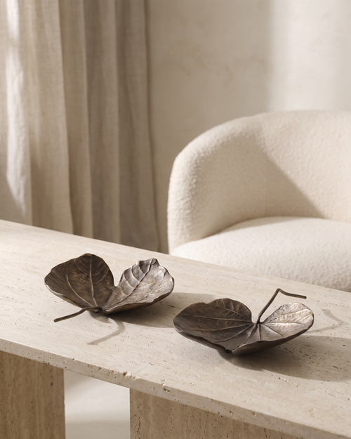 Antique Bronze Leaf Decorative Tray - styled on a travertine console in a light interior