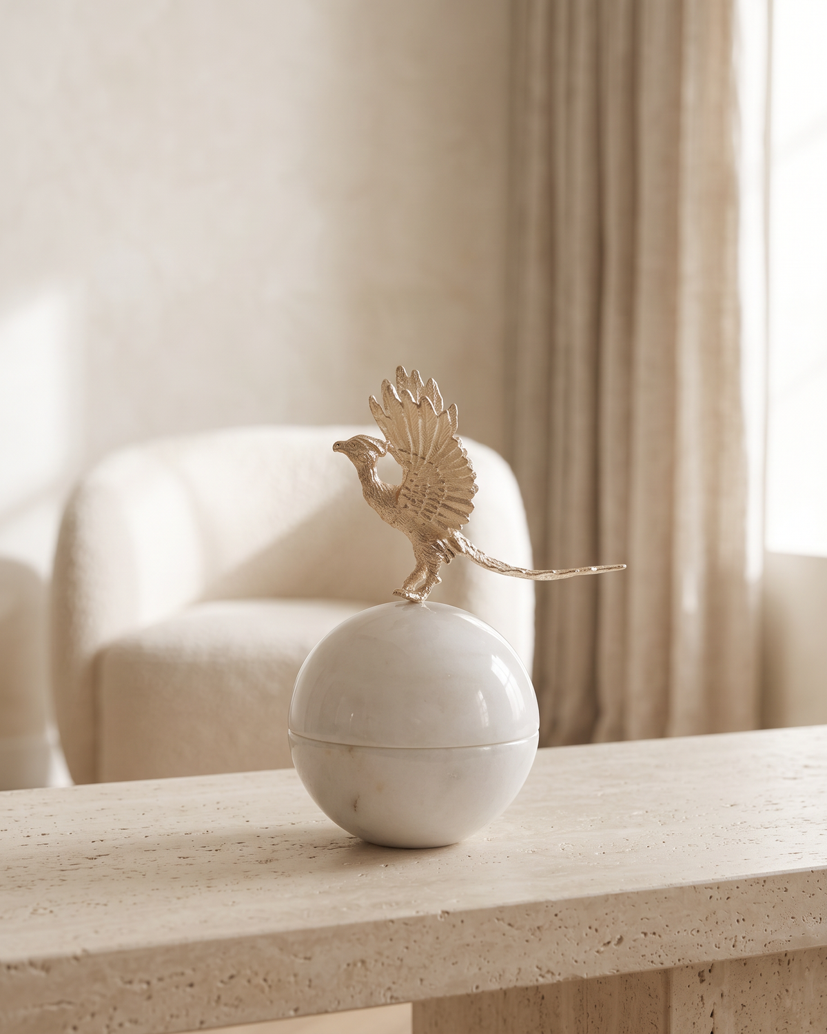 Aurea Phoenix Marble Bonbonnière - styled on a travertine console in a light interior
