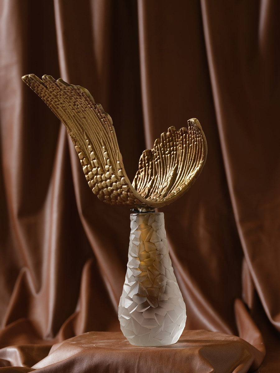 Handcrafted pieces from the collection — marble, brass and glass