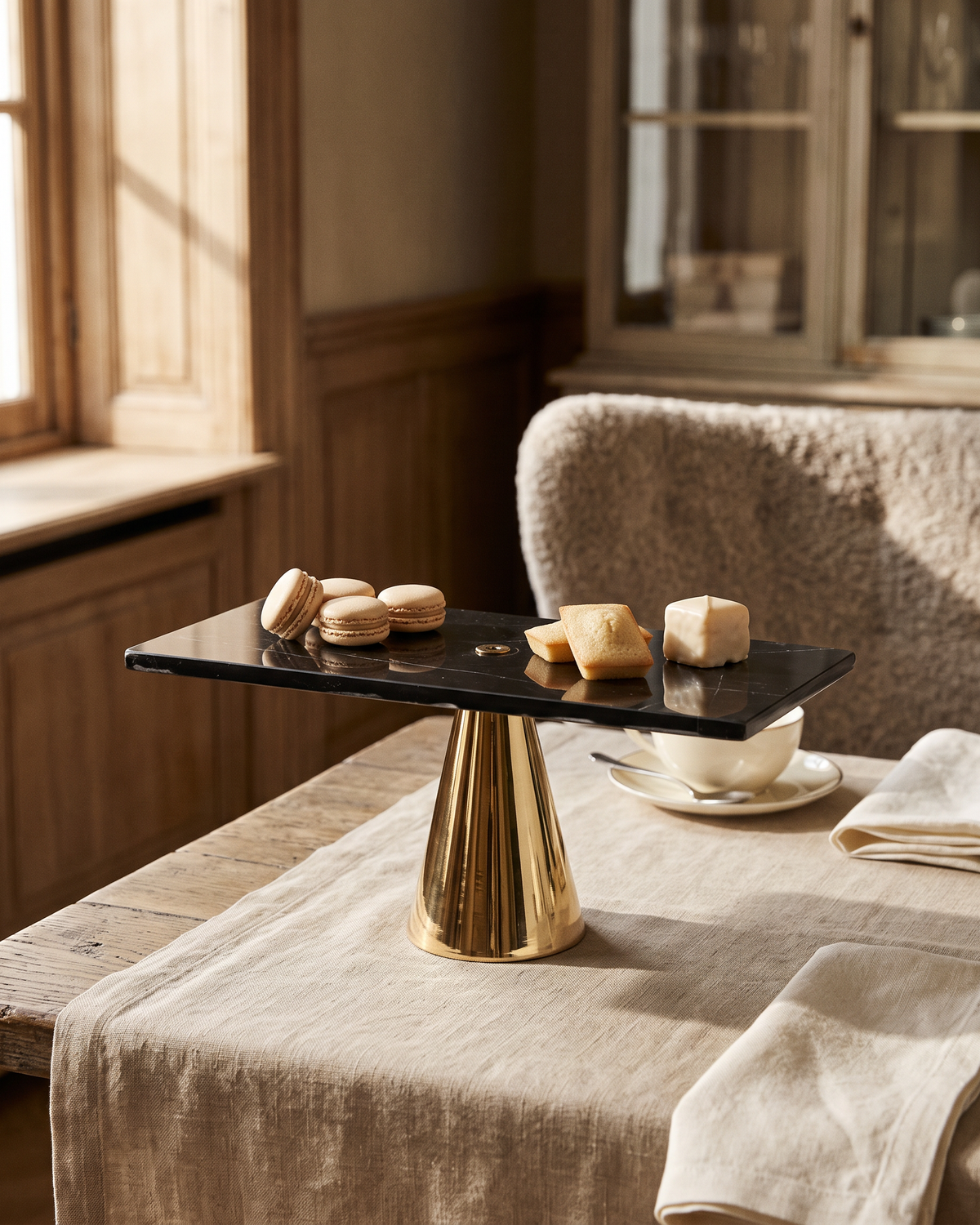 Black Marble Rectangular Cake Stand (One Piece) styled in a warm interior