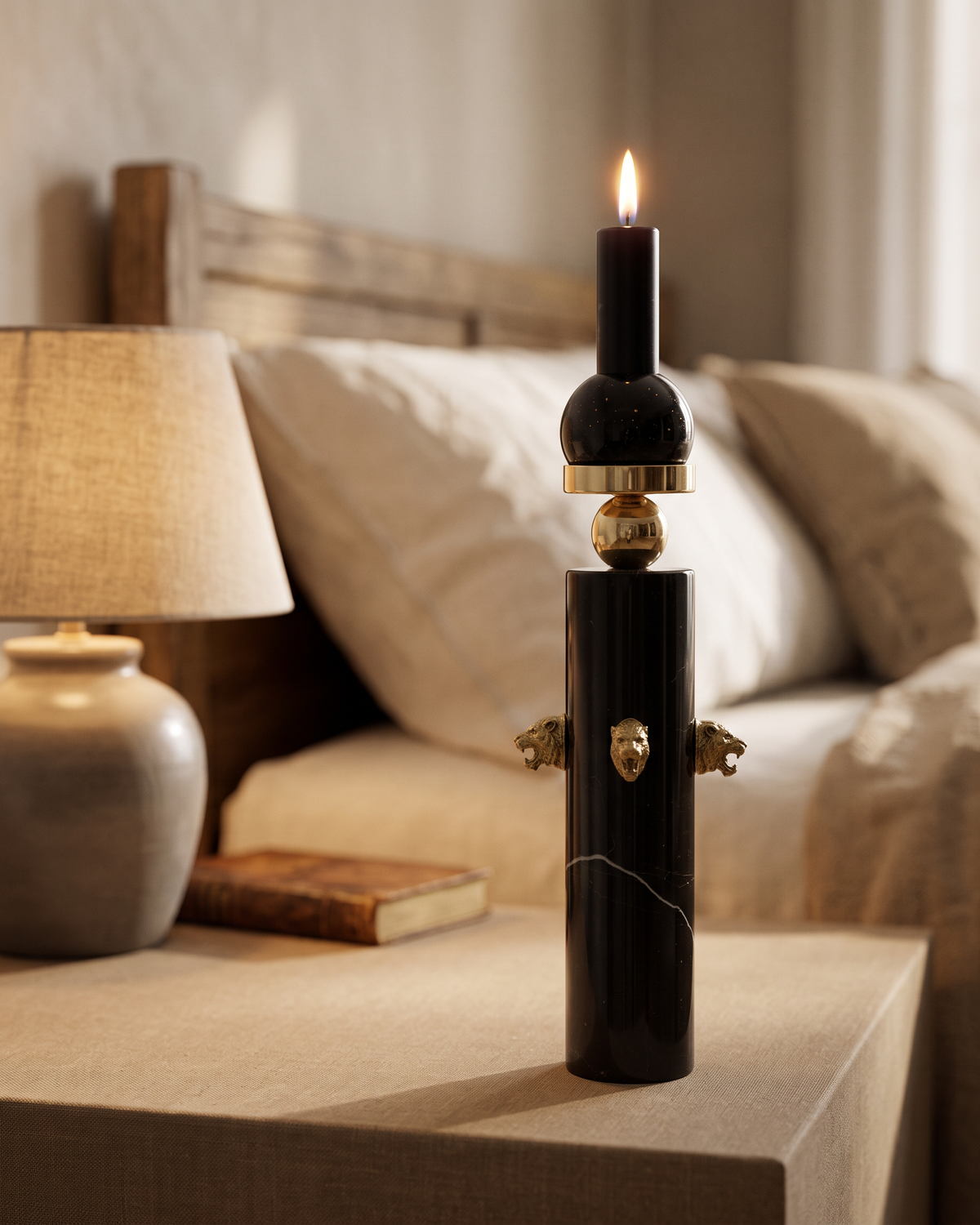 Black Marble Candle Holder with Brass Tiger Heads (One Piece) styled in a warm interior