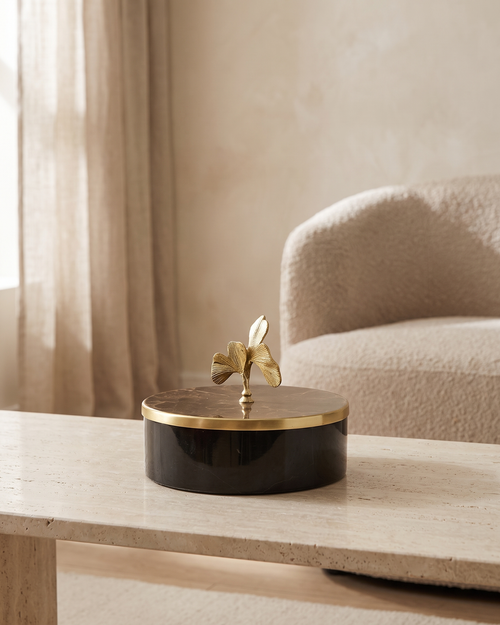 Black Marble Clover Bonbonniere - styled on a travertine console in a light interior