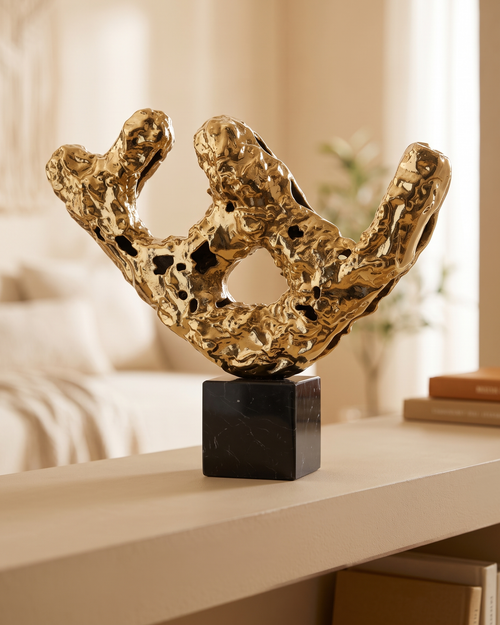 Brass Balance Log Decorative Object - styled on a warm beige console in a cosy interior