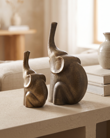 Brass Elephant Decorative Object IV - styled on a warm beige console in a cosy interior