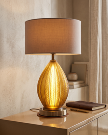 Carved Amber Glass Table Lamp — styled interior