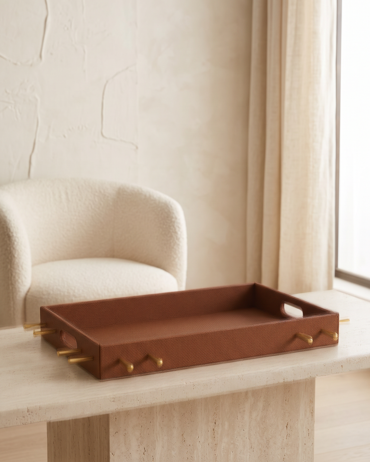 Cognac Studded Tray - styled on a travertine console in a light interior