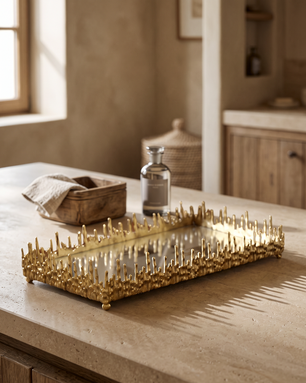 Dory Sculptural Mirrored Tray, Gold (One Piece) styled in a warm interior