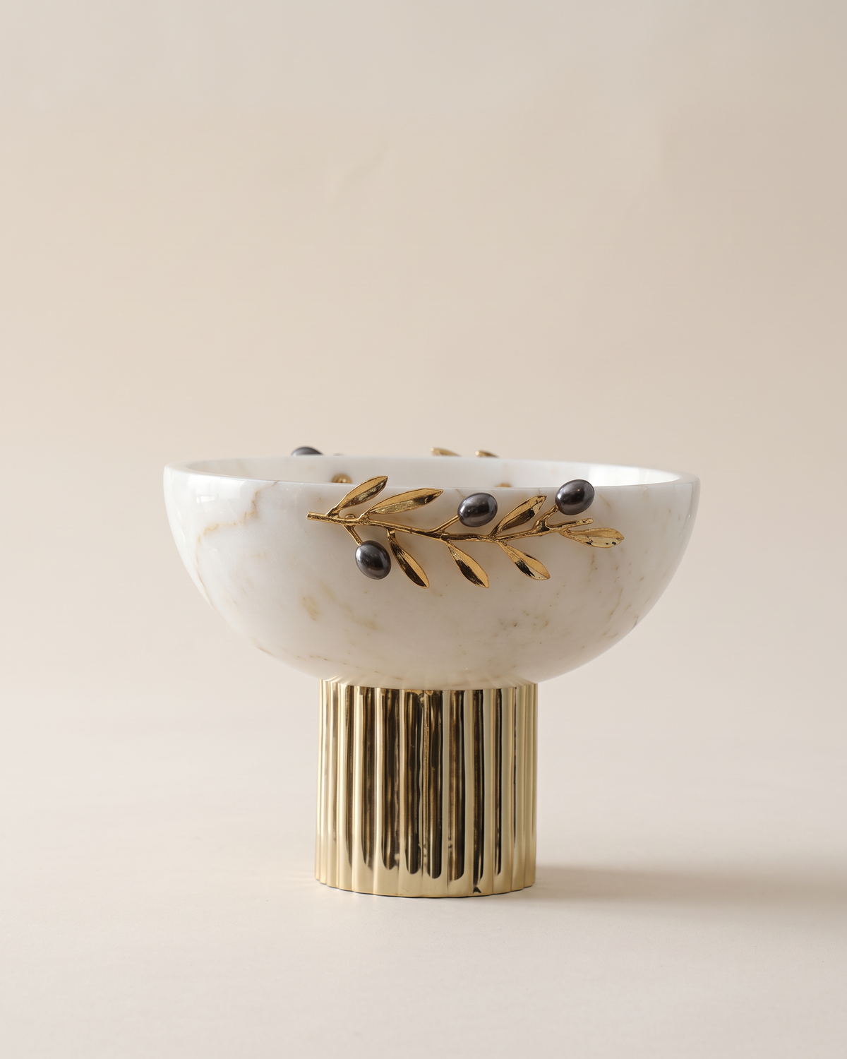 Double Olive Pedestal Bowl, White Marble (One Piece) on a warm ivory studio background