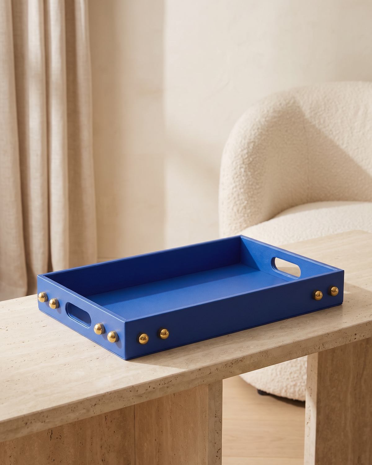 Electric Blue Studded Tray - styled on a travertine console in a light interior