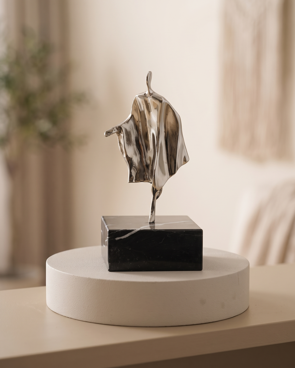 Explorer Decorative Object - styled on a warm beige console in a cosy interior