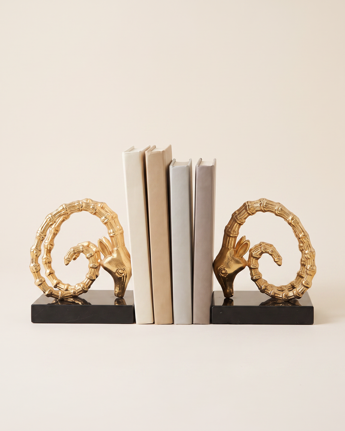 Golden Ram Horn Bookends with Black Marble Base