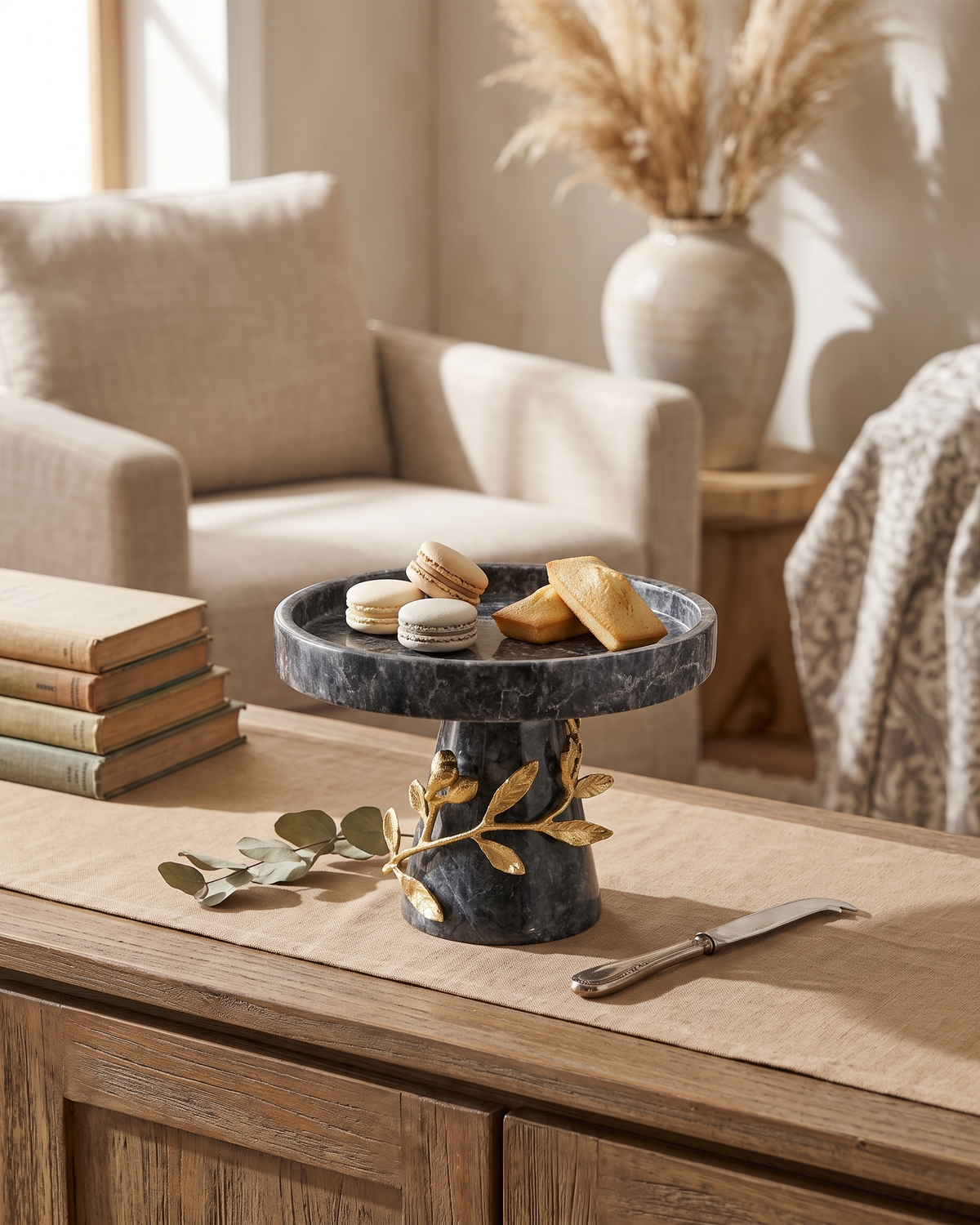 Grey Marble Pedestal Stand with Gold Leaves (One Piece) styled in a warm interior
