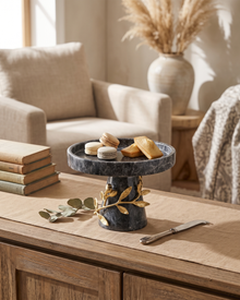 Grey Marble Pedestal Stand with Gold Leaves (One Piece) styled in a warm interior