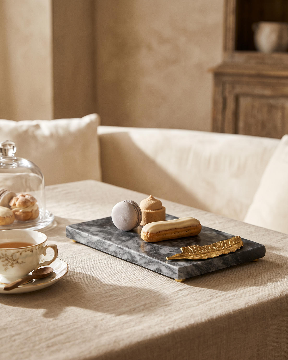 Grey Marble Serving Board with Gold Leaf (One Piece) styled in a warm interior