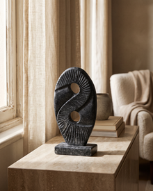 Yin-Yang Relief Sculpture (One Piece) styled in a warm interior