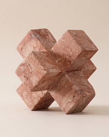 Travertine Plus Sculpture (One Piece) on a warm ivory studio background