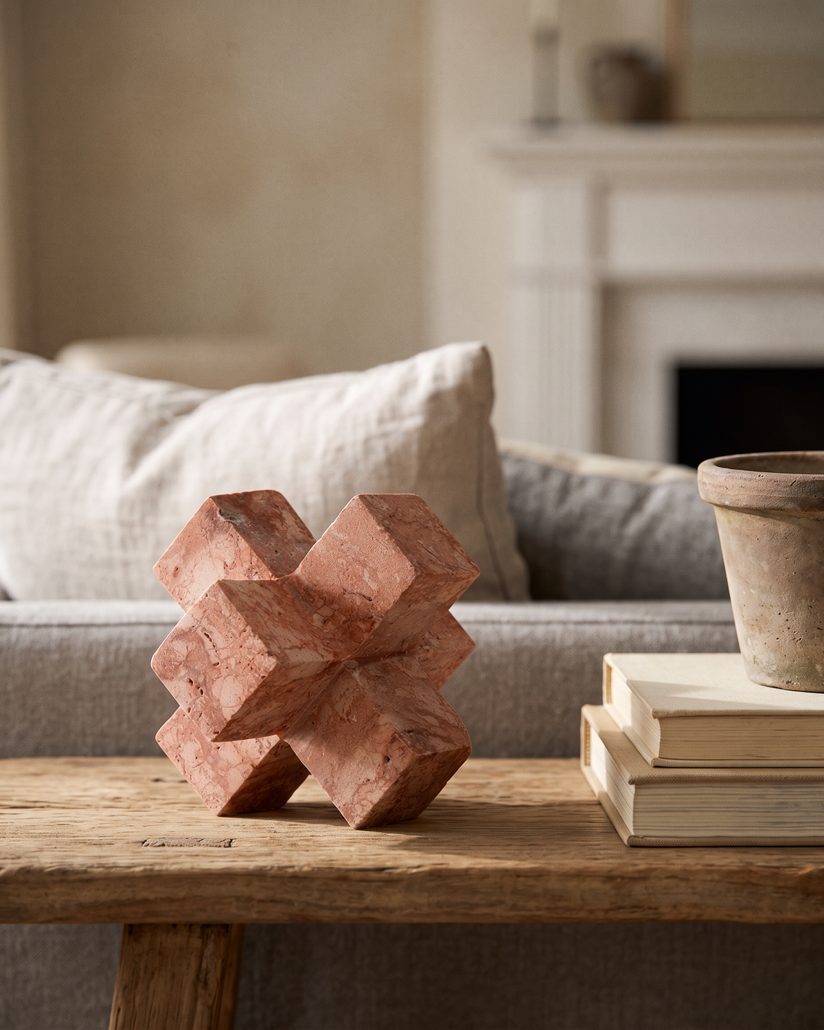 Travertine Plus Sculpture (One Piece) styled in a warm interior