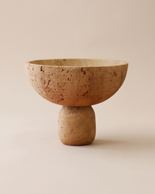 Travertine Pedestal Bowl (One Piece) on a warm ivory studio background