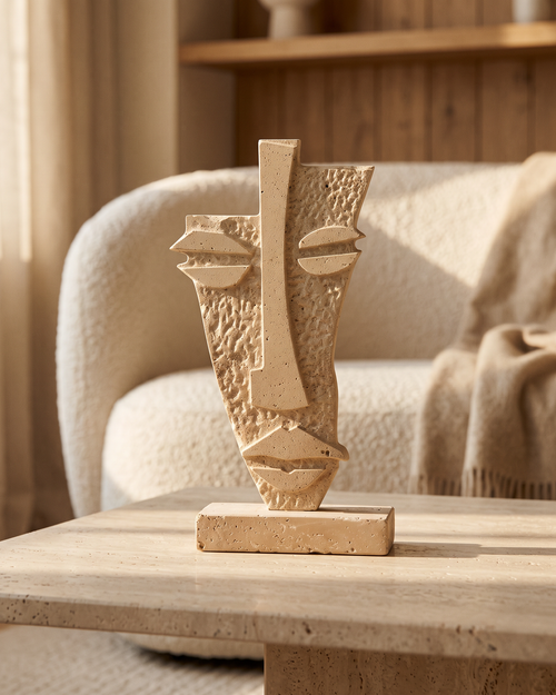 Abstract Mask Travertine Sculpture (One Piece) styled in a warm interior
