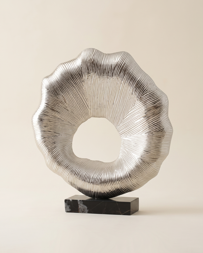 Silver Sunburst Ring Sculpture on Black Marble Base