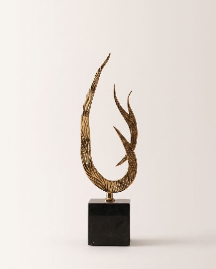 Golden Flame Sculpture on Black Marble Base
