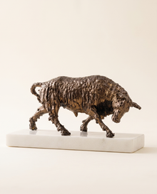 Bronze Bull Sculpture On White Marble Base