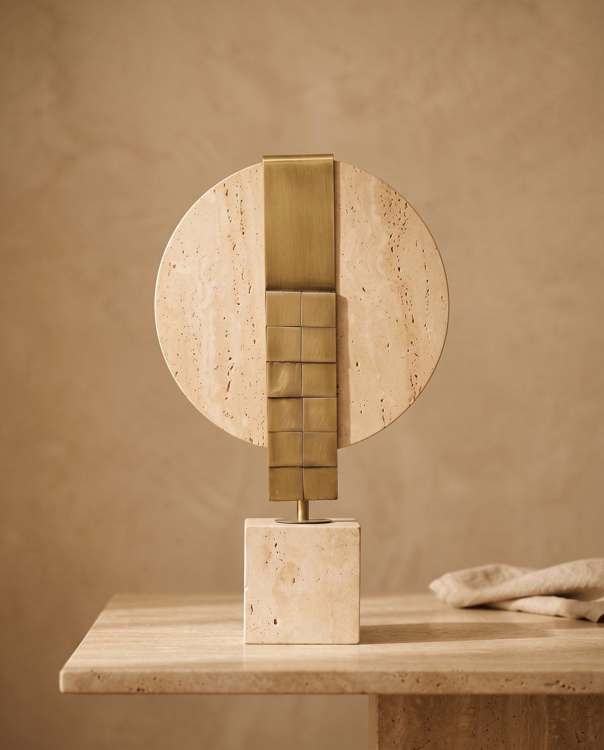Travertine Disc Decorative Object Large - styled warm beige console scene