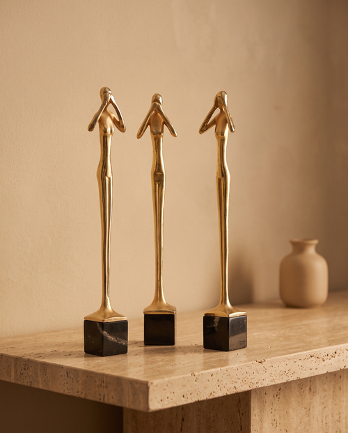 Brass Three Wise Women Sculpture - styled warm beige console scene