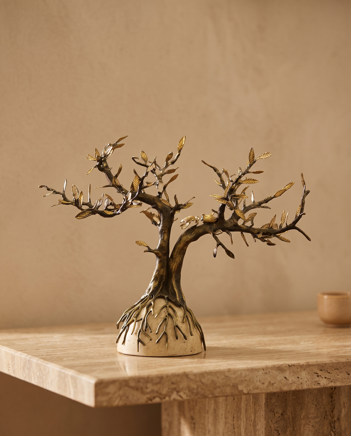 Brass Tree Sculpture - styled warm beige console scene