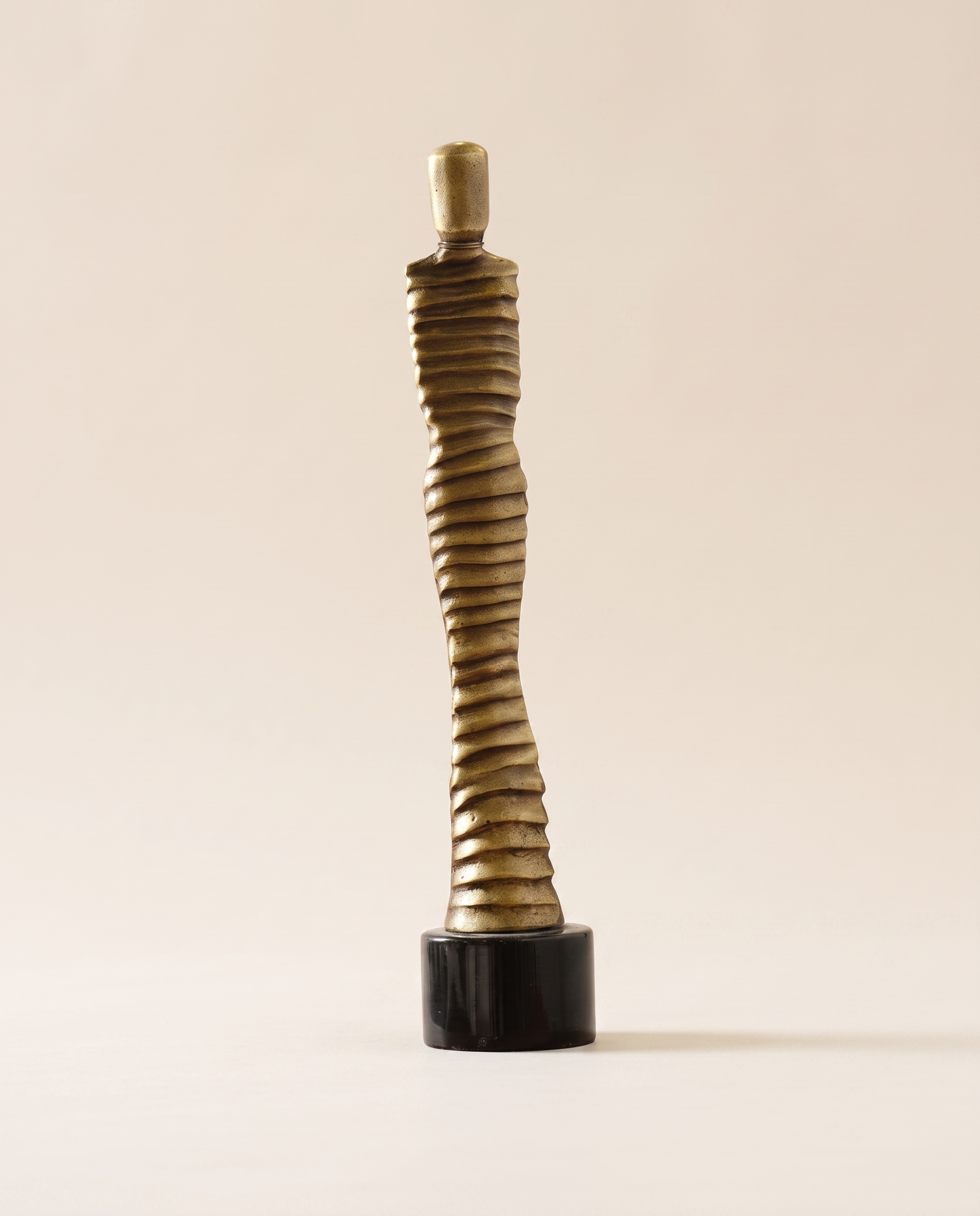Bronze Mummy Man Brass Sculpture - warm ivory studio hero shot