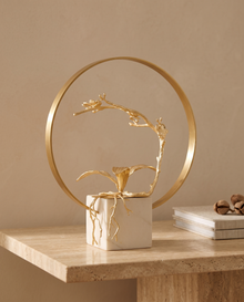 Golden Blossom Ring Sculpture - styled warm beige console scene