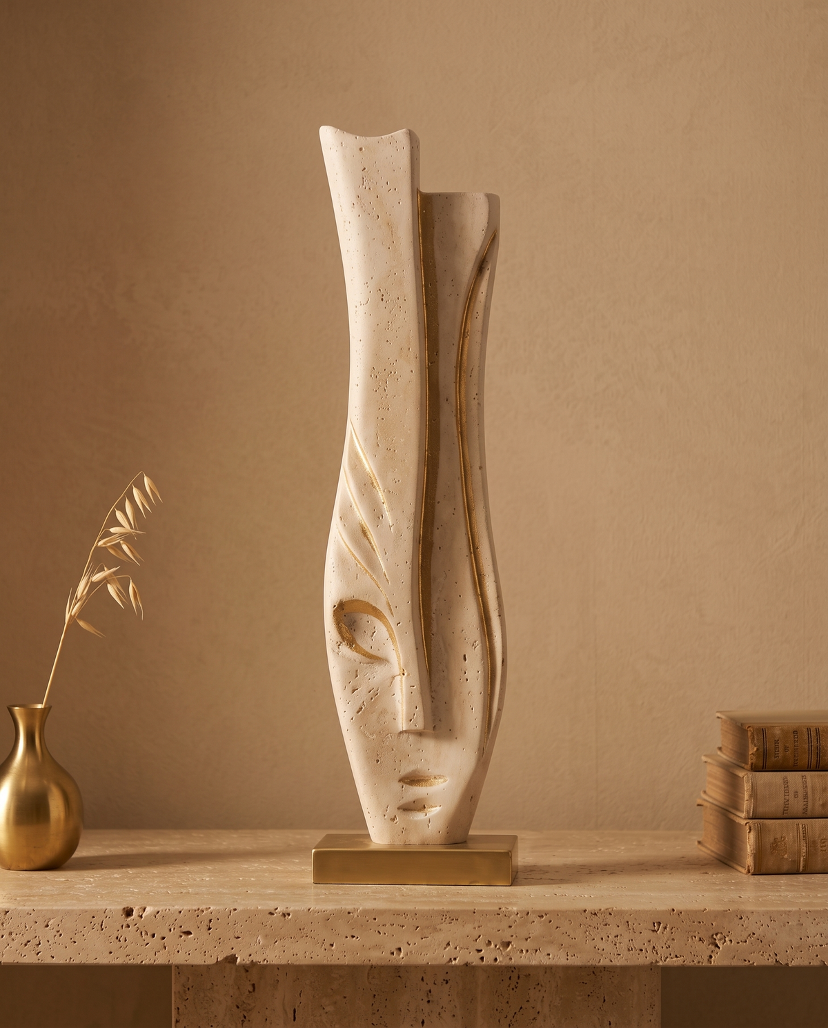 Travertine Face Sculpture with Gold Base - styled warm beige console scene