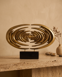 Venus Horizon Sculpture Golden Solid Brass - styled warm beige console scene