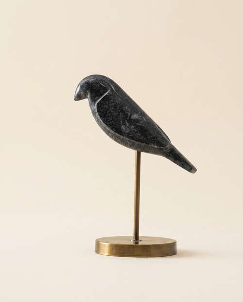 Black Marble Bird on Brass Base Medium - warm ivory studio hero shot
