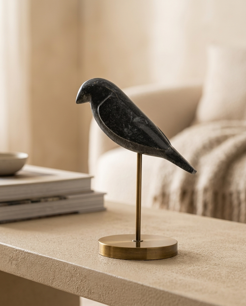 Black Marble Bird on Brass Base Medium - styled warm beige console scene