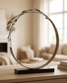 Circle Decorative Object with Leaf - styled warm beige console scene